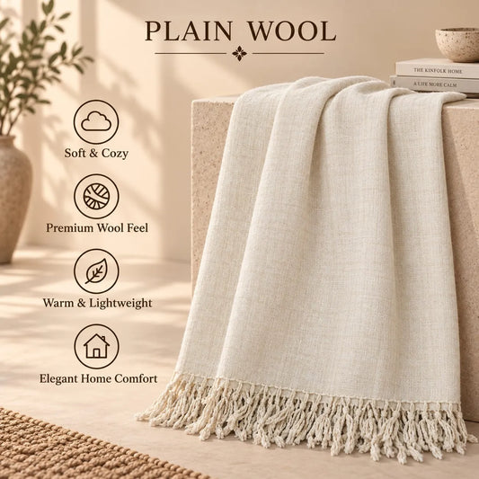 Plain Wool shawl in soft beige with a smooth texture and fringed edges, offering warm and lightweight comfort.