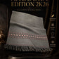 Angoora Edition 2K26 grey woolen shawl with intricate red and black patterned border and fringed edges
