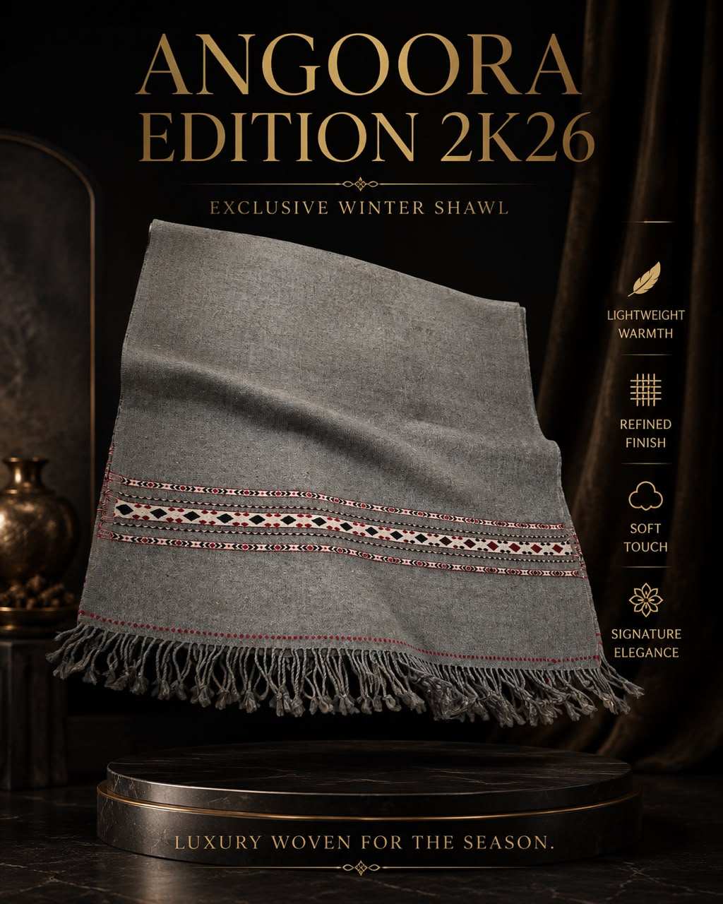 Angoora Edition 2K26 grey woolen shawl with intricate red and black patterned border and fringed edges