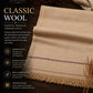 Classic Wool Shawl in beige wool with subtle dark decorative stripe and fringed edges, providing warmth and timeless style
