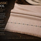 Classic Wool Shawl in soft beige wool with subtle horizontal embroidered pattern and fringed edges for winter warmth